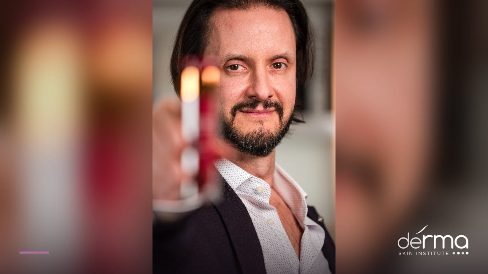 Dr. Dusan Sajic, dermatologist at deRMA Skin Institute Guelph, holding an injectable treatment vial